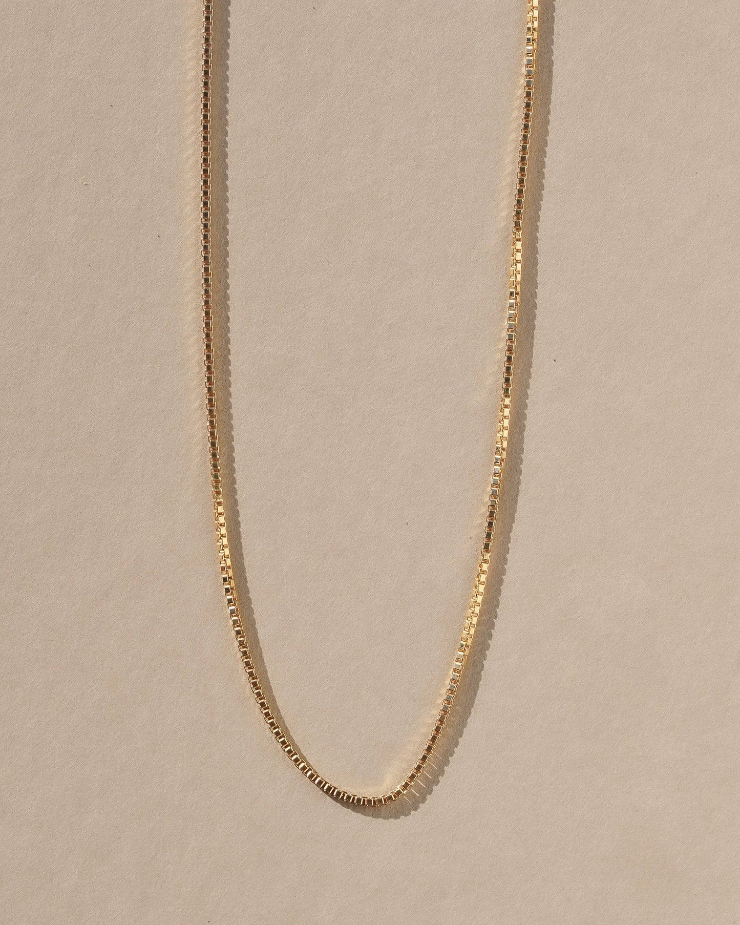 A delicate light weight classic box chain that’s light as air and catches the light just right, perfect for layering or adding a favorite pendant. Handmade in the Santa Cruz Mountains.