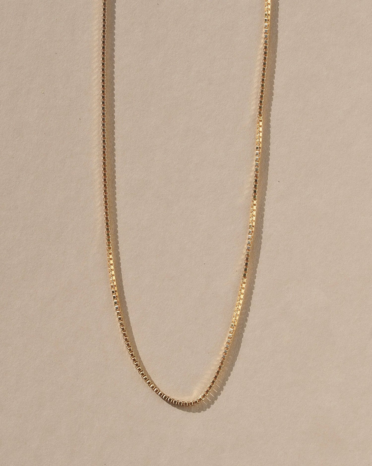 A delicate light weight classic box chain that’s light as air and catches the light just right, perfect for layering or adding a favorite pendant. Handmade in the Santa Cruz Mountains.