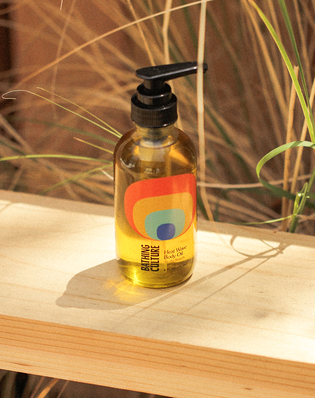 heat wave body oil by bathing culture / Smooth it all out with this solar restorative, anti-inflammatory, natural moisture retainer. Formulated with plants that provide skin nourishing vitamins (C+E), essential fatty acids, amino acids and antioxidants to help restore and repair skin, lock in moisture, and bring balance to complexion. 