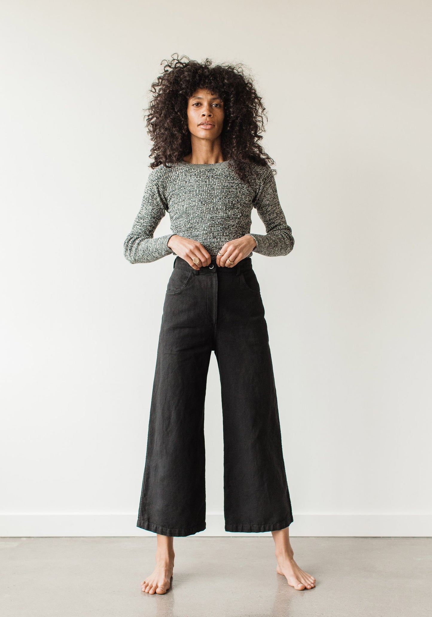 The new easy, everyday, go with anything trouser. Designed with a flattering high rise that is fitted through the hips and opens to a comfortable wide leg opening. Cut from an OEKO Tex Certified linen/cotton blend canvas twill, equal parts structure and comfort. First Rite sold at Thread Spun.