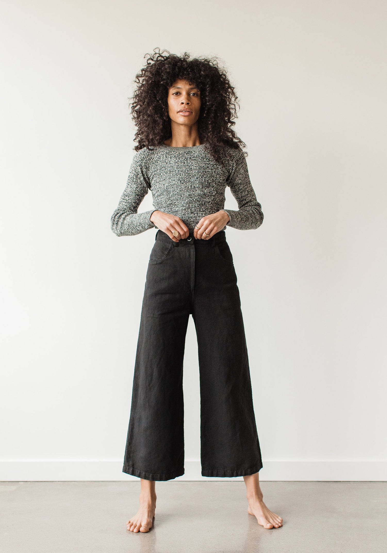 The new easy, everyday, go with anything trouser. Designed with a flattering high rise that is fitted through the hips and opens to a comfortable wide leg opening. Cut from an OEKO Tex Certified linen/cotton blend canvas twill, equal parts structure and comfort. First Rite sold at Thread Spun.