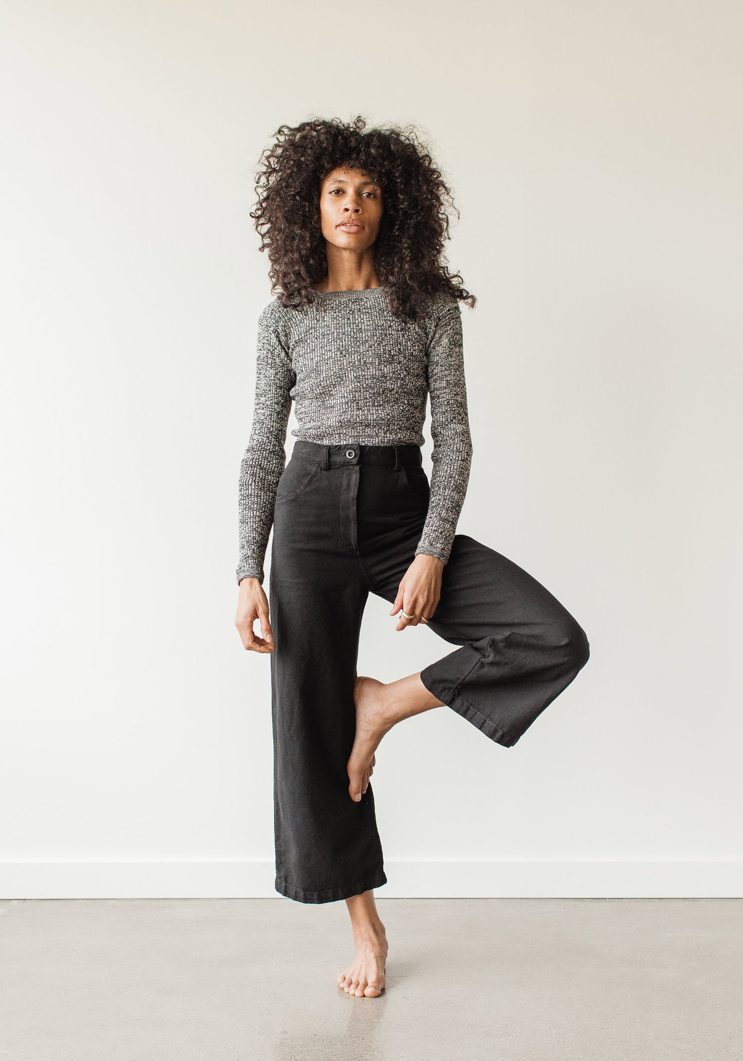 The new easy, everyday, go with anything trouser. Designed with a flattering high rise that is fitted through the hips and opens to a comfortable wide leg opening. Cut from an OEKO Tex Certified linen/cotton blend canvas twill, equal parts structure and comfort. First Rite sold at Thread Spun.