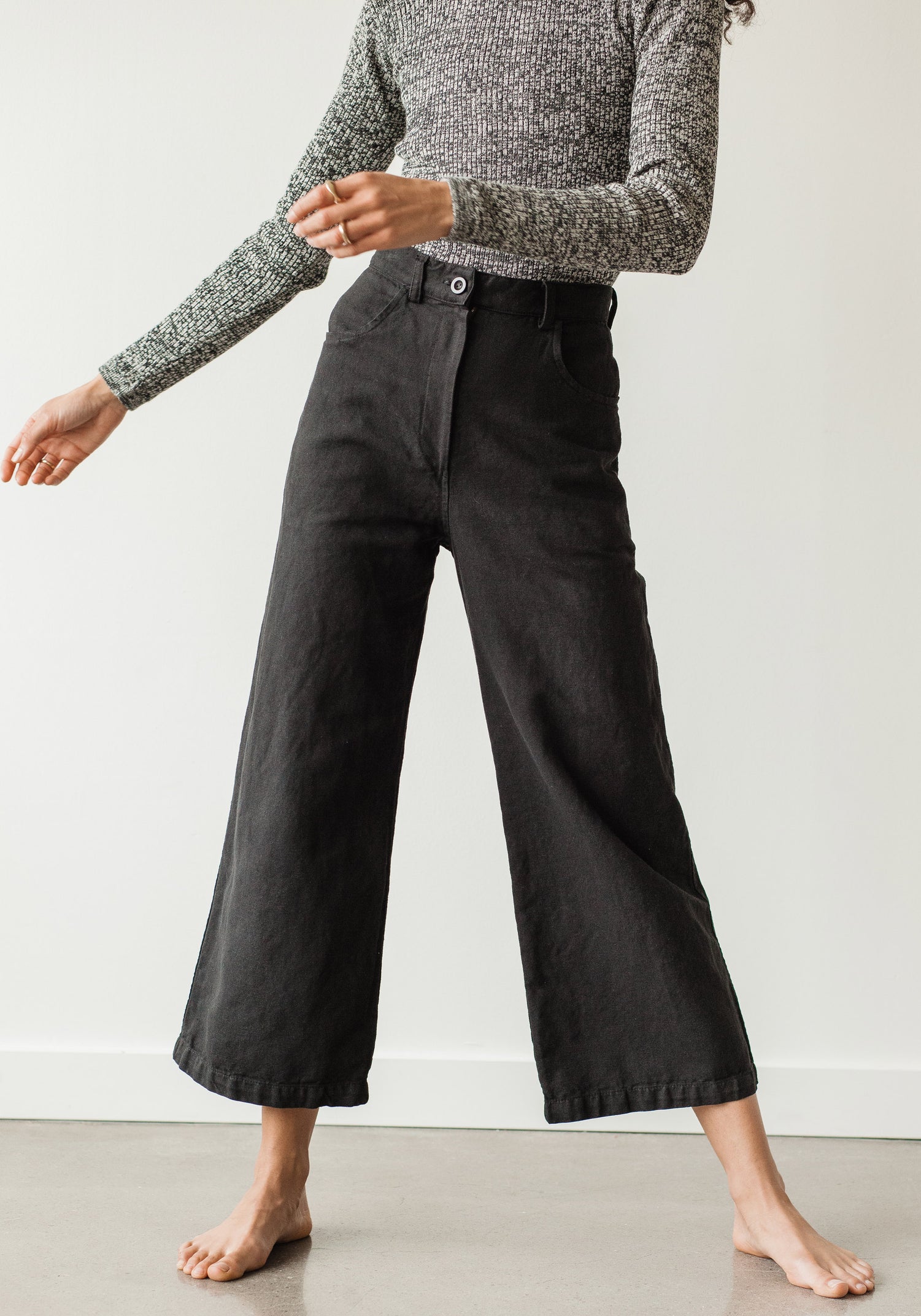 The new easy, everyday, go with anything trouser. Designed with a flattering high rise that is fitted through the hips and opens to a comfortable wide leg opening. Cut from an OEKO Tex Certified linen/cotton blend canvas twill, equal parts structure and comfort. First Rite sold at Thread Spun.