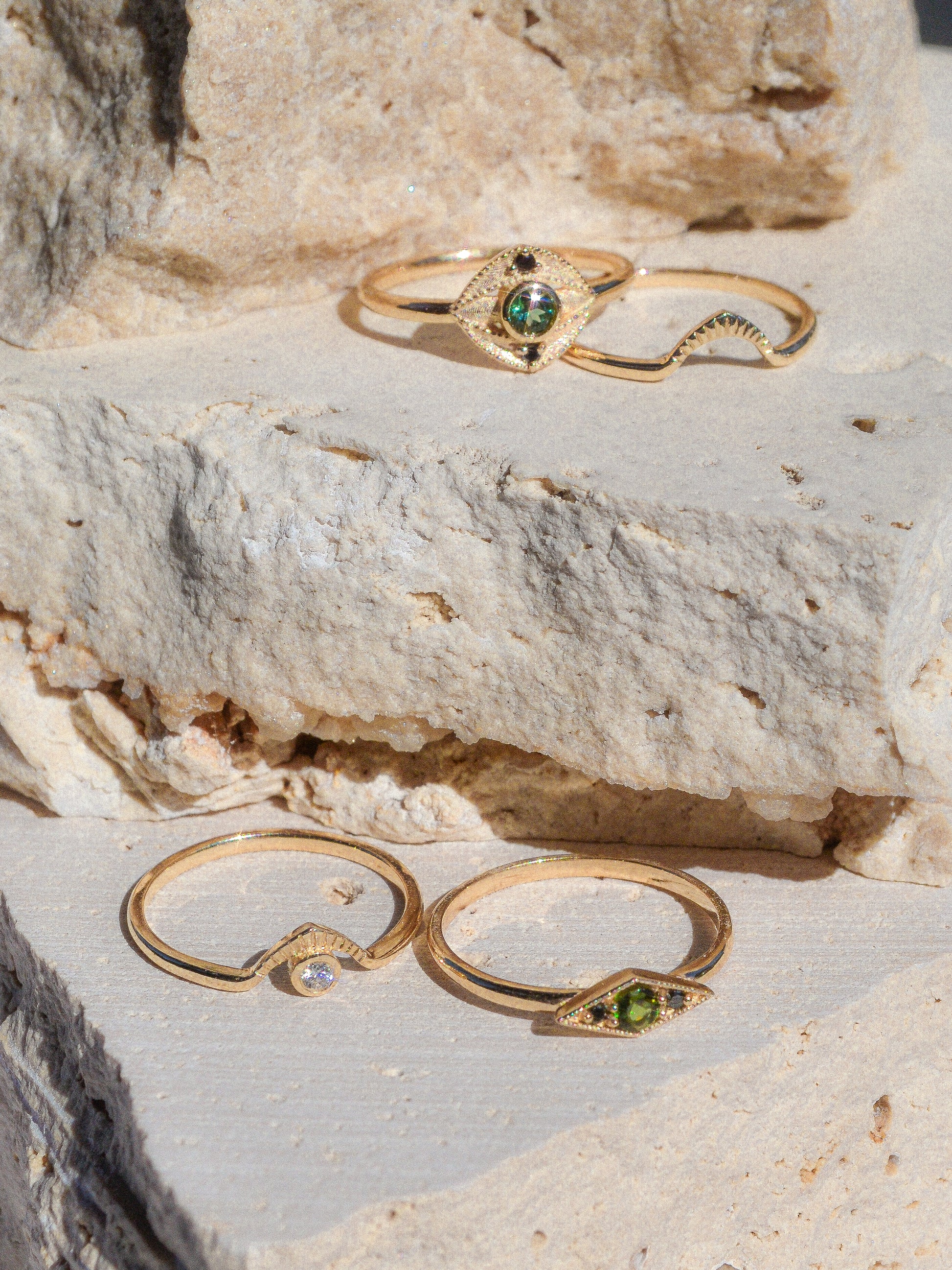 Blue green tourmaline encompassed in an eye shape of solid 14k yellow gold and 2 white diamonds. Inspired by an island in western Scotland. Each Miarante piece is carefully handcrafted in Chicago by a skilled production team.