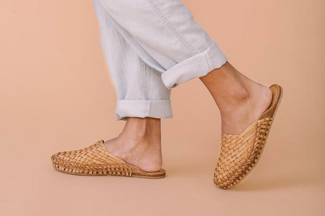 Handcrafted, woven leather slides from Northern Karnataka, India, by Mohinders in natural, water buffalo leather. Sold by Thread Spun.