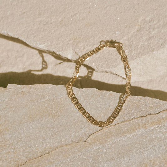 A unique statement bracelet ~ the Fortune Bracelet is an elegant and minimal chain link bracelet that glides and dips along the wrists. Made in 18K gold fill, this piece stands out beautifully when layered or worn alone. Handmade in the Santa Cruz Mountains.
