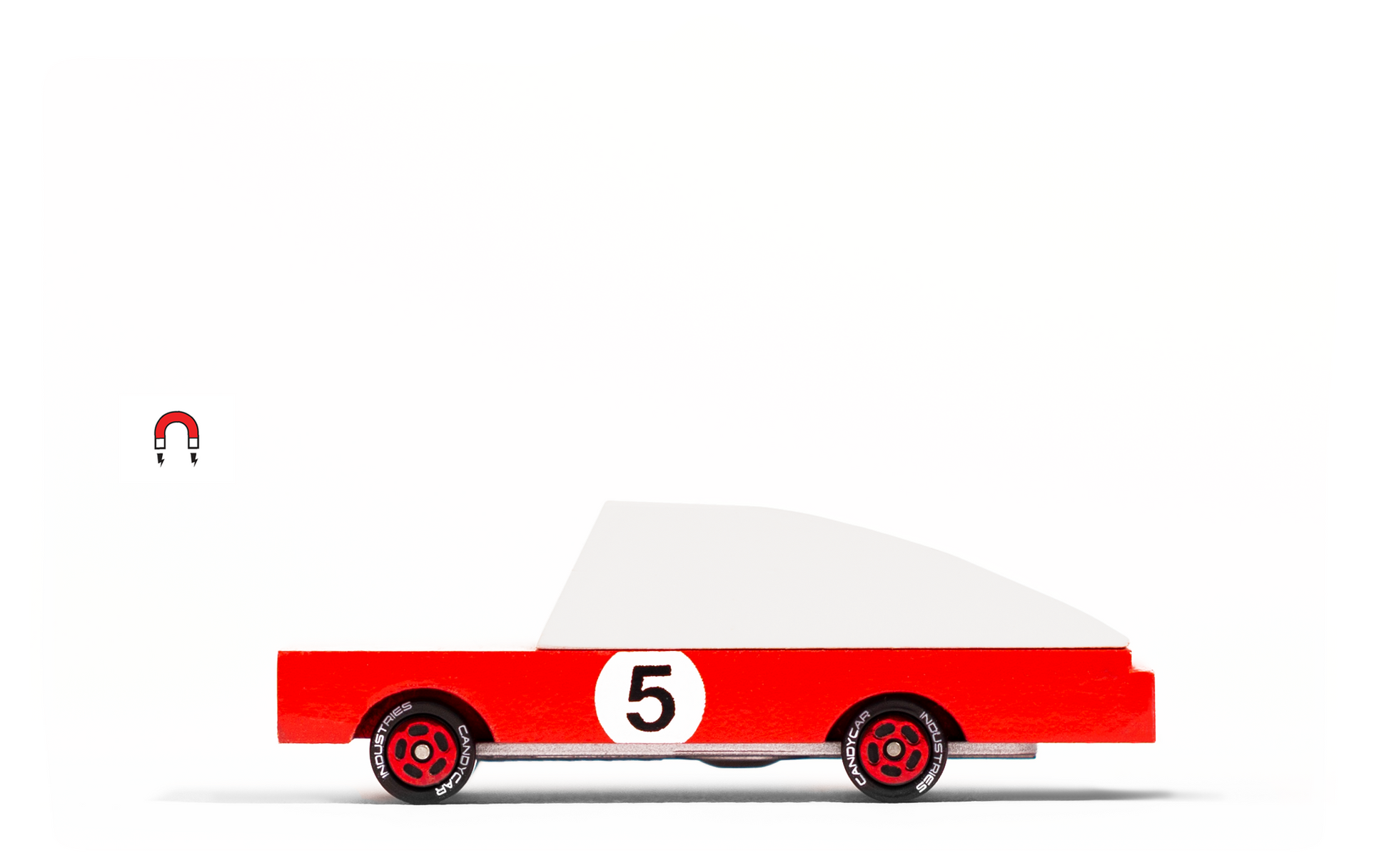 Red Racer classic toy car by Candylab Toys features solid beech wood and water-based paints. Made sustainably, made to last, made for fun.  Available at thread spun