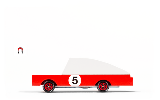 Red Racer classic toy car by Candylab Toys features solid beech wood and water-based paints. Made sustainably, made to last, made for fun.  Available at thread spun