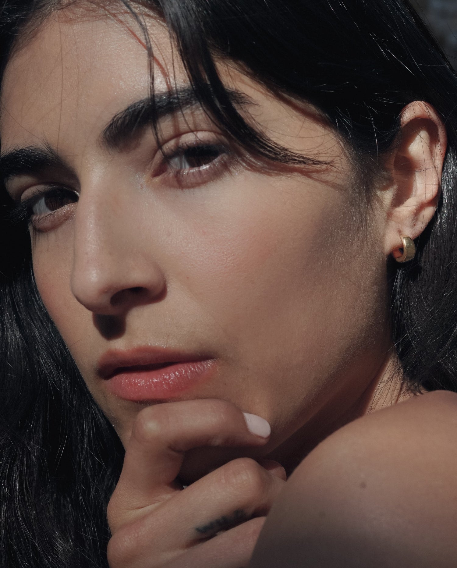 Organic and understated hoops with a luxurious feel.  The Cocoon Hoops hug the earlobe just perfectly.  Details:  hand cast in bronze or sterling silver 1 cm across sterling silver posts + backs