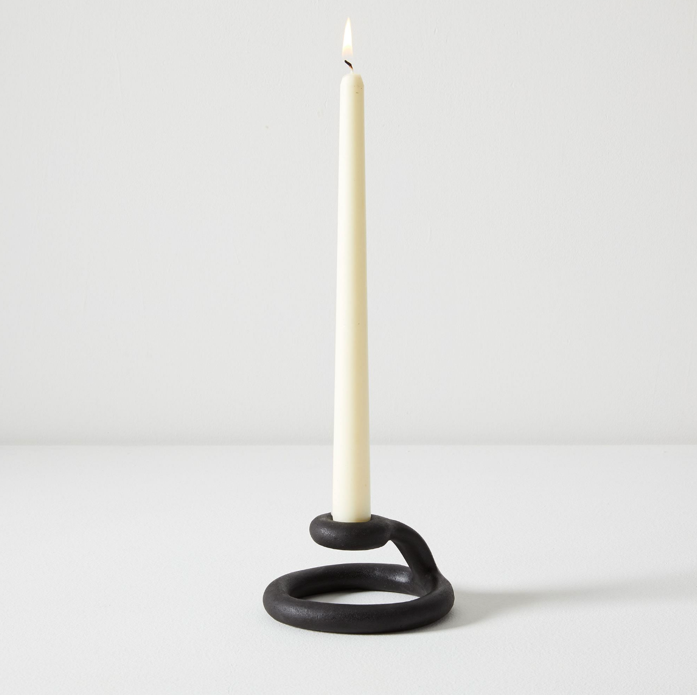 Virginia Sin coil built Uni candlestick helps you light up your life with something other than your dance partner. Handmade in Brooklyn, NY.