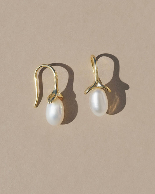 These floral inspired organic pearl drop earrings add a touch of feminine flare and are perfect for a night out, a day at the office or an afternoon frolicking in a field of wildflower blooms. Handmade in the Santa Cruz Mountains.