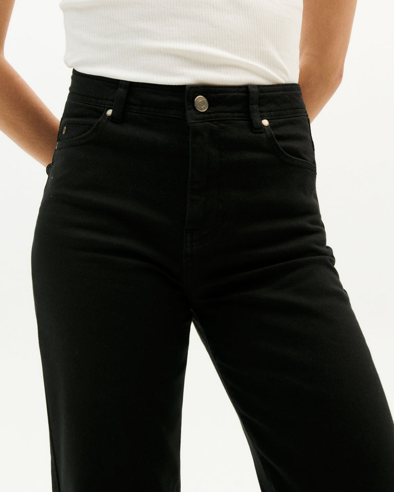 A classic, high waisted pant with straight cut leg.  99% organic cotton 1% elastane - Sustainably made in Turkey. theresa black pants by thinking mu