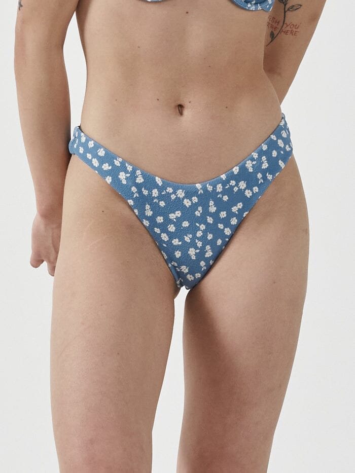 Made from eco-friendly recycled materials, the Aster Bikini Bottoms offers an eco-conscious choice without compromising on style, so you can feel just as good as you look! Designed in Byron Bay, Australia.