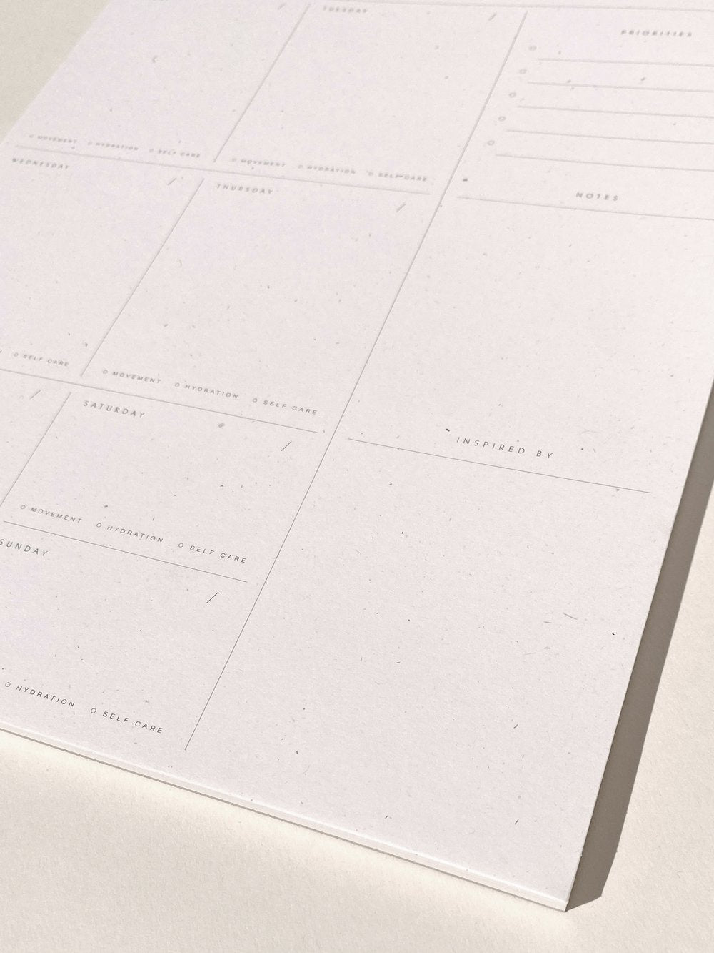 An essential from Wilde House Paper– Introducing the new & improved minimal desk accessory to organize your week & be your best self. Made with recycled paper.