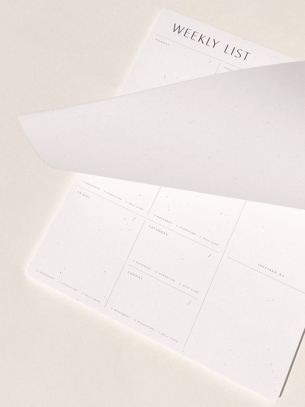 An essential from Wilde House Paper– Introducing the new & improved minimal desk accessory to organize your week & be your best self. Made with recycled paper.