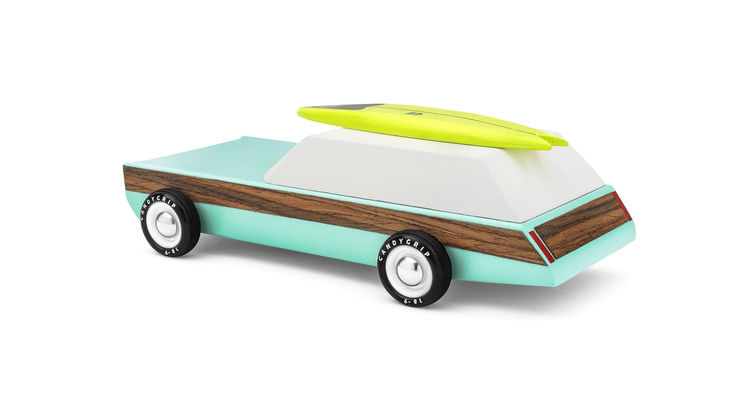 The famous classic, now in a boxier 80's vibe. With real veneer-paneled sides and a magnet embedded in the roof, it comes with a surfboard that snaps onto it. This car also features a magnetic tow hook - allowing it to hitch to our equally awesome trailer.