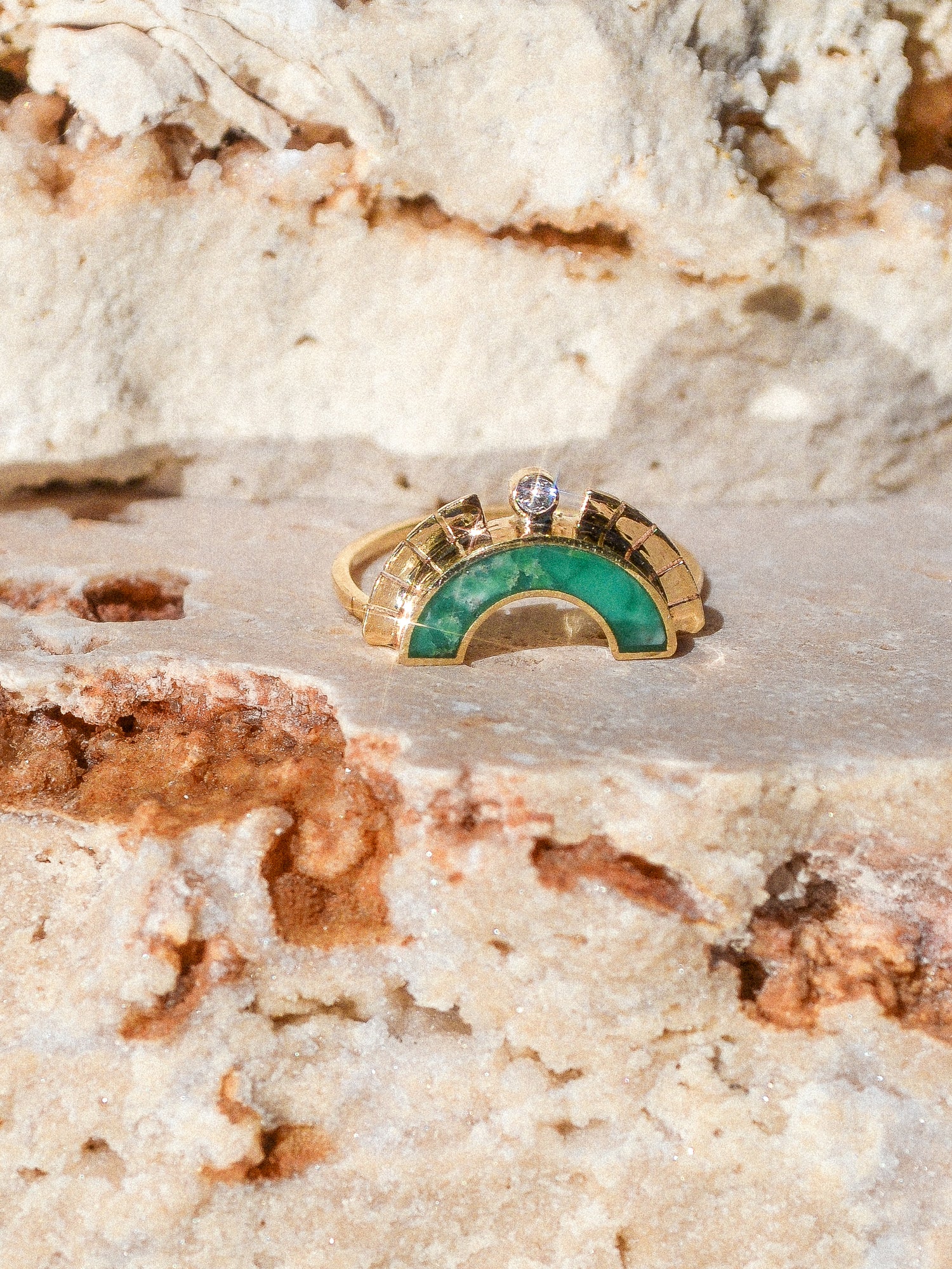 RISING SOL ARCH CROWN / The inlaid Broken Arrow turquoise is hand cut and shaped to fit perfectly inside this 14K gold bezel. A Young in the Mountain signature carved halo features a .03 ct conflict-free white diamond that brings beautiful light to this piece