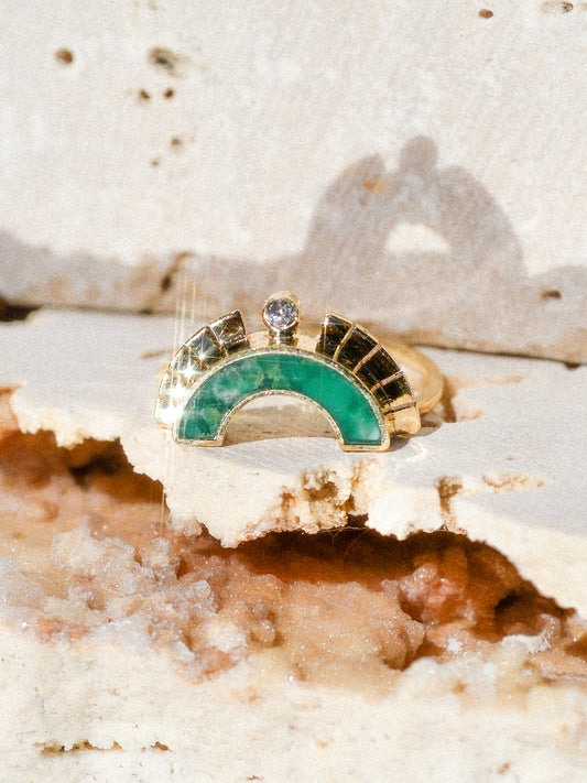 RISING SOL ARCH CROWN / The inlaid Broken Arrow turquoise is hand cut and shaped to fit perfectly inside this 14K gold bezel. A Young in the Mountain signature carved halo features a .03 ct conflict-free white diamond that brings beautiful light to this piece. 