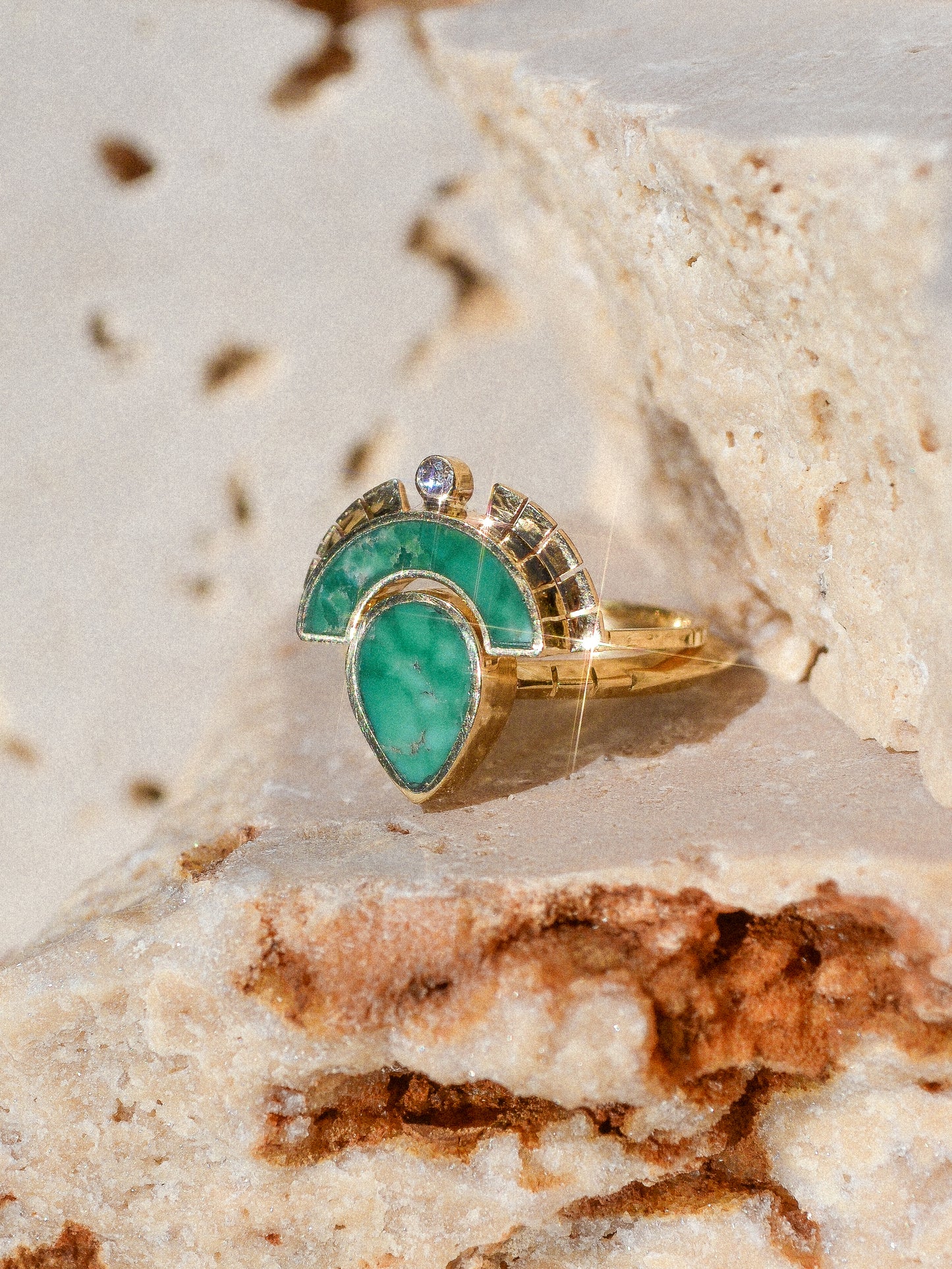 RISING SOL ARCH CROWN / The inlaid Broken Arrow turquoise is hand cut and shaped to fit perfectly inside this 14K gold bezel. A Young in the Mountain signature carved halo features a .03 ct conflict-free white diamond that brings beautiful light to this piece