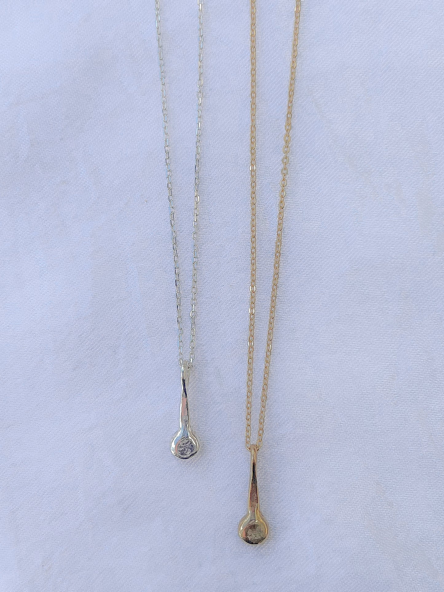 Handmade simple talisman necklace to adorn your neck. Sustainably made in northern California by Amanda Hunt.
