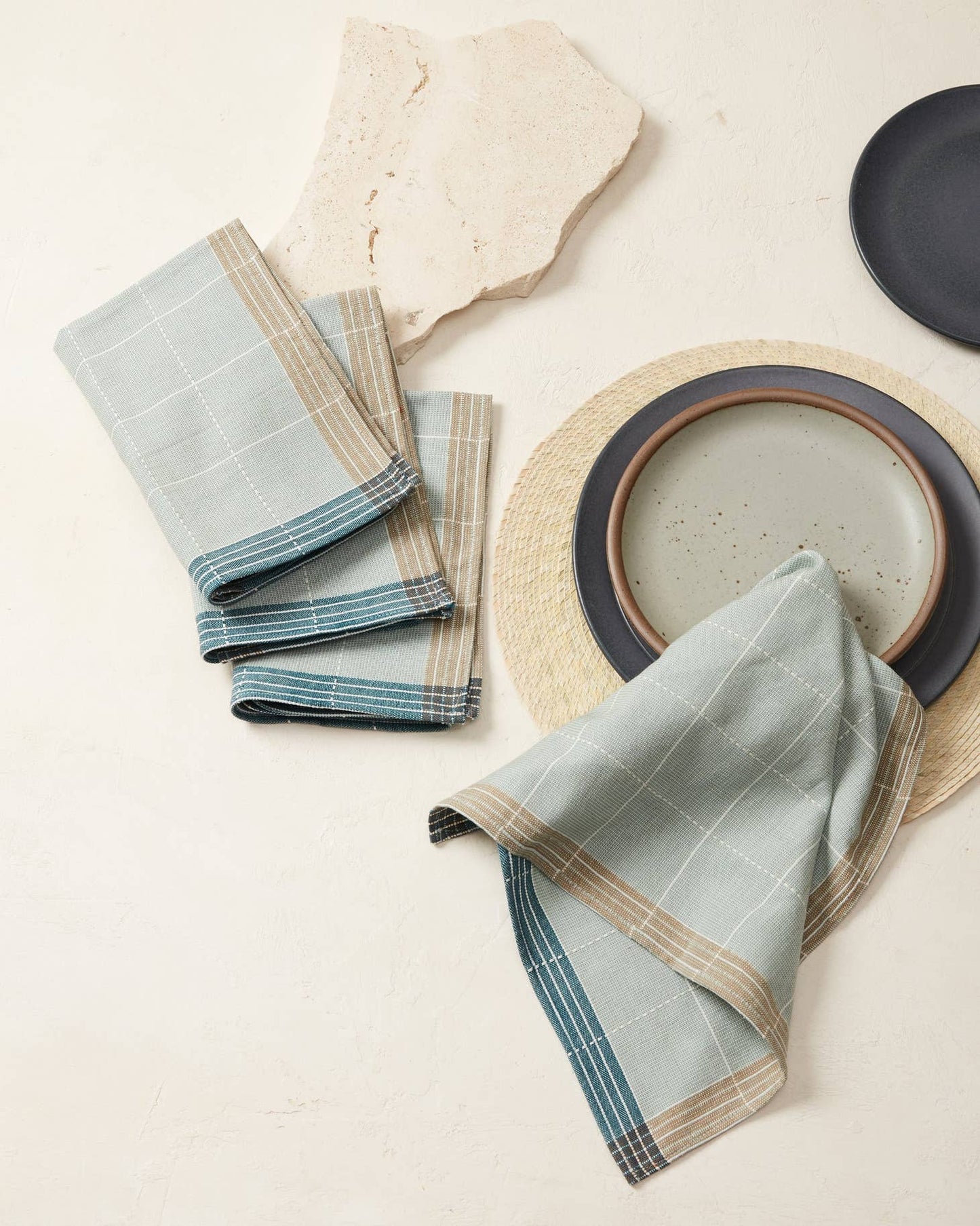 Inspired by gridlines on a map and the color of birds, handwoven 100% cotton napkins feature a rust and dove window pane plaid with striped edging. Add a pop of color for everyday dining, or layer for special occasions. Handwoven in Chiapas, Mexico.