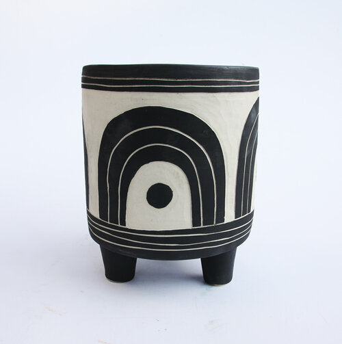 Hand carved tripod ceramic planter with black interior glaze and drainage hole. Comes with handmade black drainage tray. Made in Portland. 