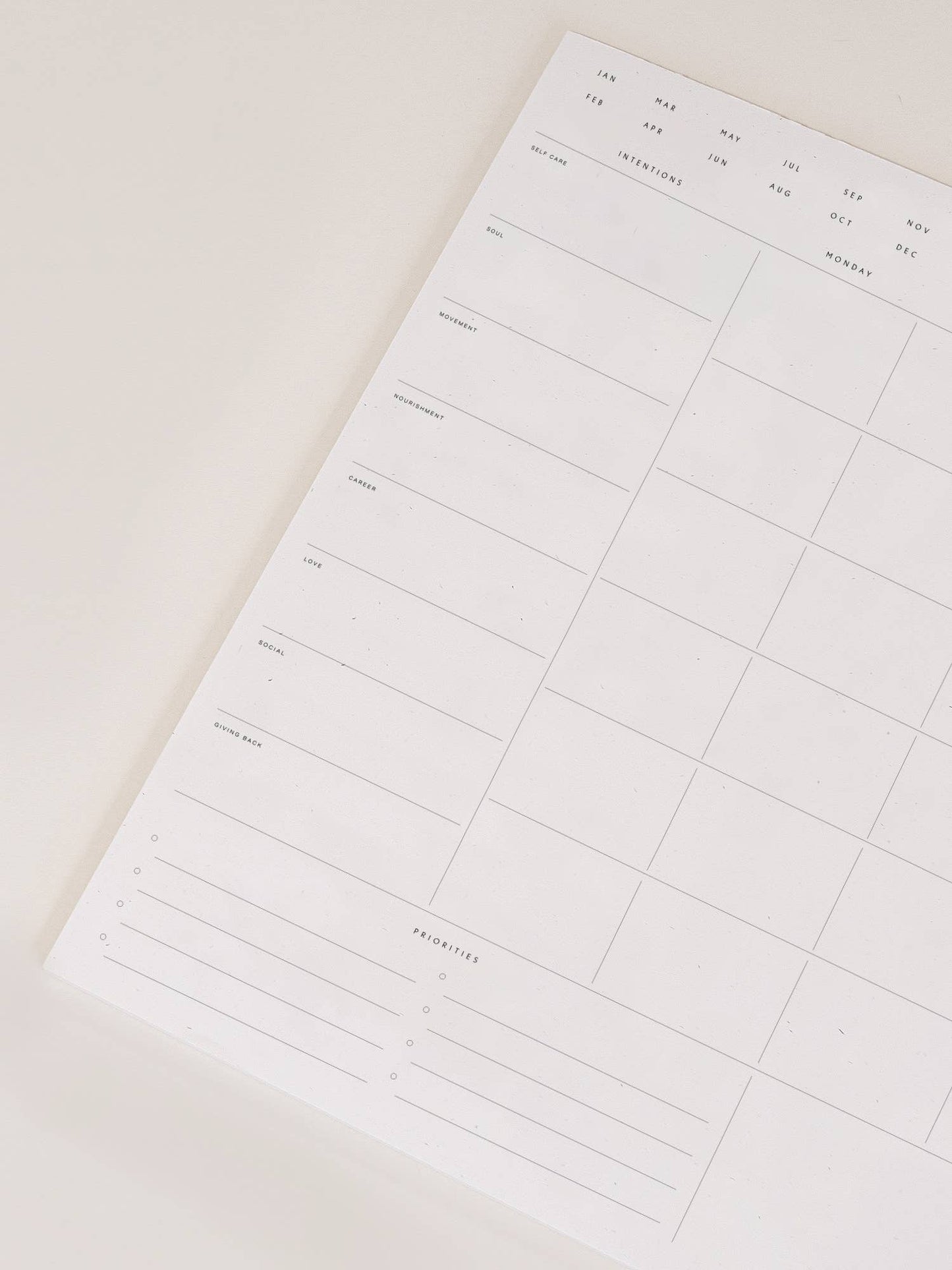 A minimal pad from Wilde House Paper; Introducing the new & improved minimal desk accessory to organize your month & be your best self. Made with recycled paper.