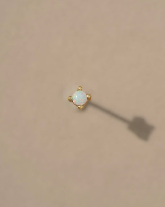 Tiny vibrant Australian Opals set in 14k gold vermeil prongs on sterling silver posts. Handmade in the Santa Cruz Mountains.