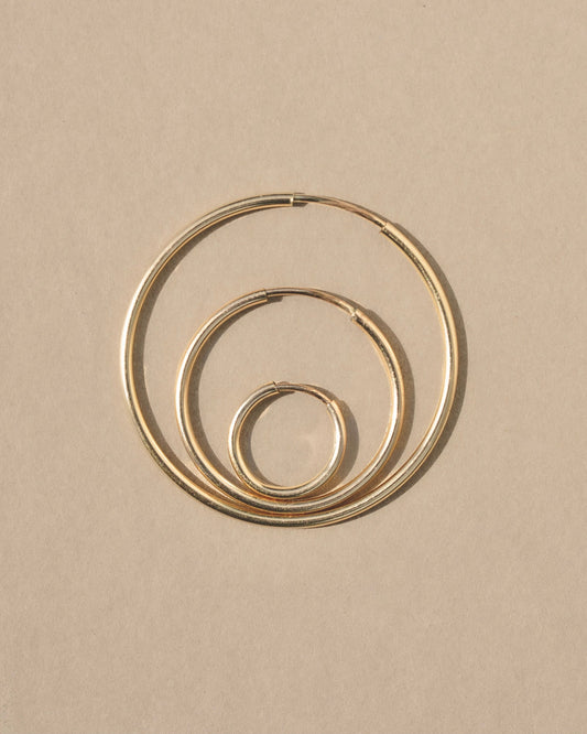 Simple seamless light weight hollow hoop earrings for any day and everywhere. Every jewelry collection needs its foundational basics and a simple hoop is a timeless classic you’ll keep on rotation, perfect for any occasion. Handmade in the Santa Cruz Mountains.