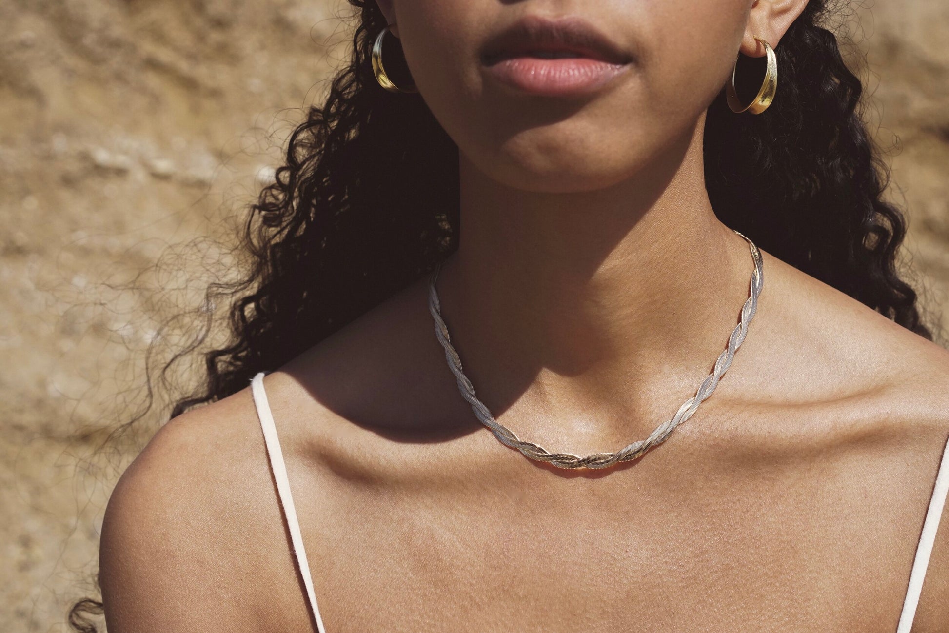 Kalia Necklace by Mountainside Jewelry. A dramatic flat textured twisted chain necklace with fine braided detail - an elegant addition to any style, designed to be dainty and delicate as well as bold and fierce, this piece was crafted by hand with love and care. Handmade in the Santa Cruz Mountains.