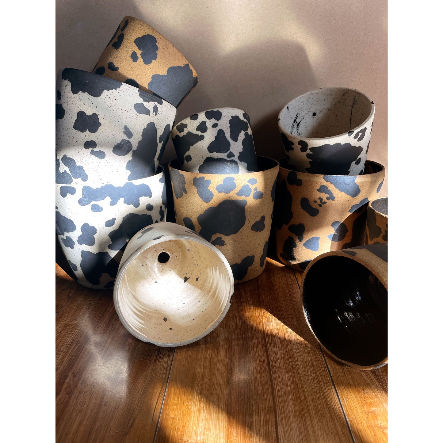 Handmade ceramic planter with a fun, hand painted cow print! Made with love in Oceanside, California by Hola Tonto Ceramics.