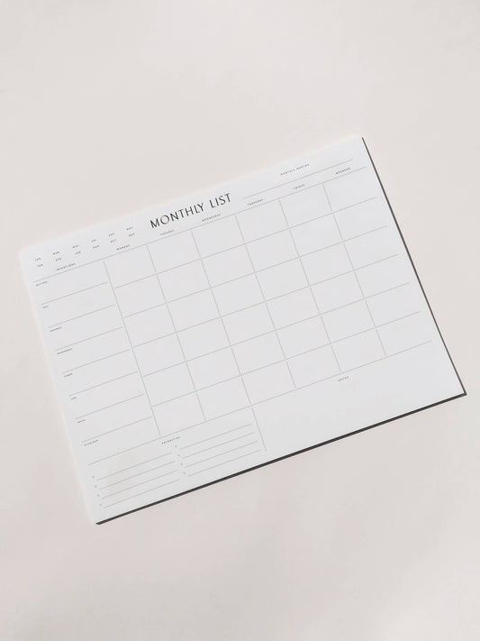 A minimal pad from Wilde House Paper; Introducing the new & improved minimal desk accessory to organize your month & be your best self. Made with recycled paper.