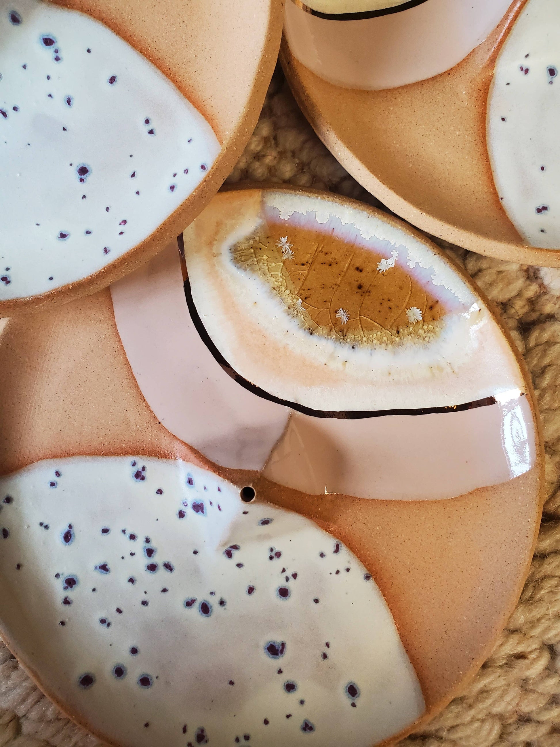 Handmade ceramic incense dish made in Philadelphia with love and enthusiasm. This incense dish features unique designs and colors with gold luster accents.