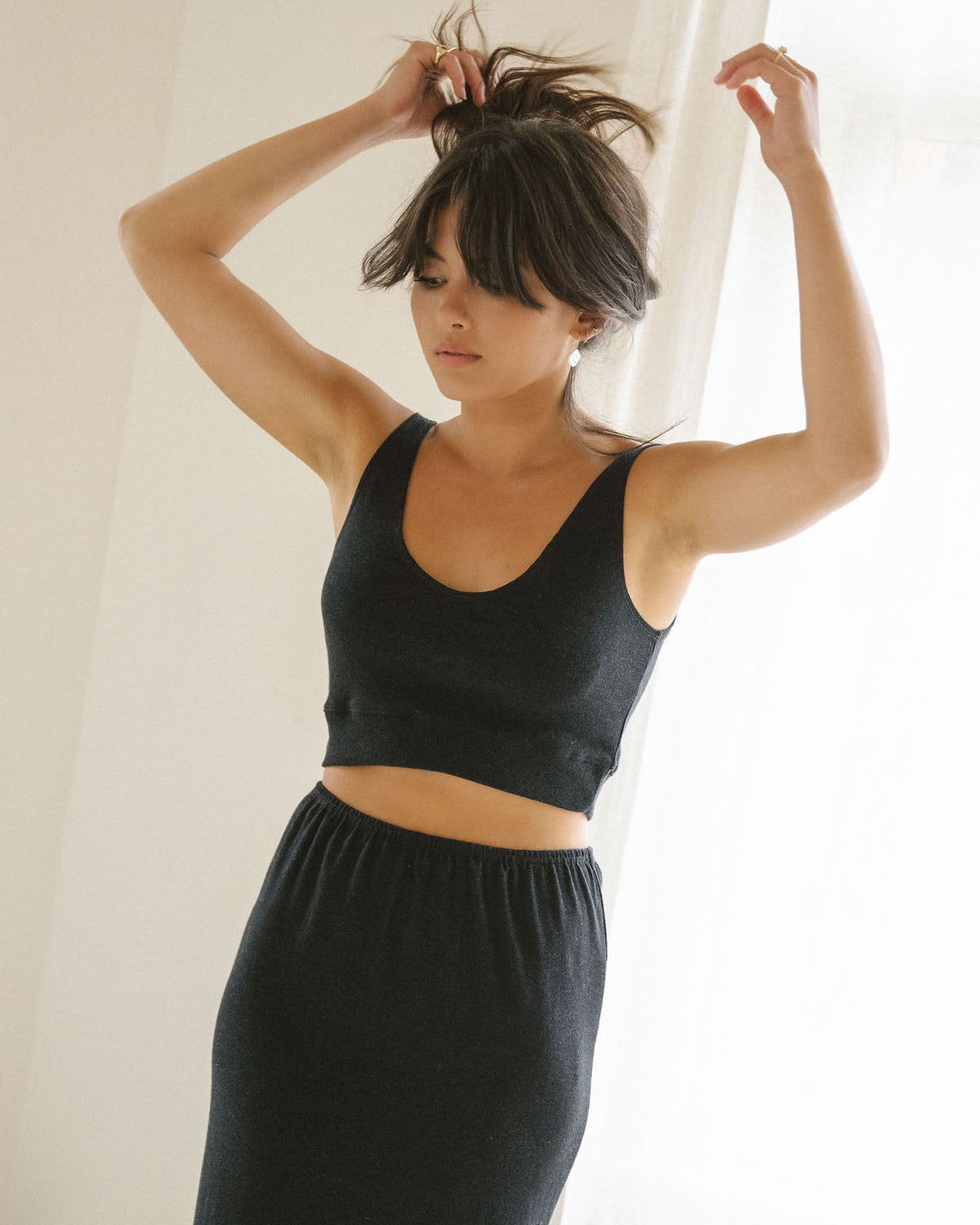 The closet staple top that is equally comfy as it is stylish. A cropped, form fitting mid-weight knit top that lays flat on the ribbed cage and is flattering on all kinds of body types. Handmade with 100% cotton in Vancouver, BC.