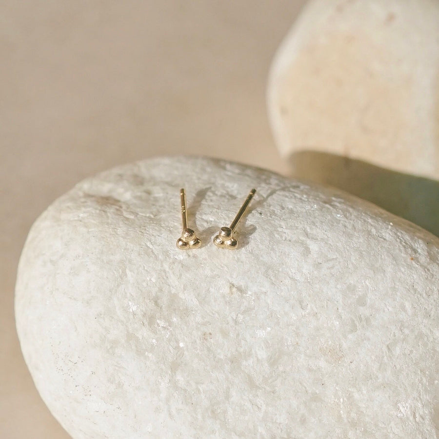 A simple tiny delicate cluster stud earring inspired by sandy shores and pebbles along the path. Handmade in the Santa Cruz Mountains.