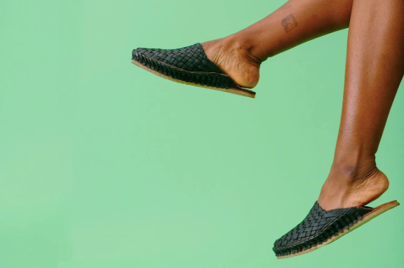 Handwoven black leather slides by Mohinders Shoes made in India in an ethical environment. Every pair is dyed by hand in a simple process using water + iron. 