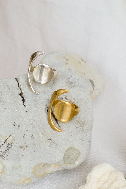 Handmade, yellow bronze equinox ring: a symbol of the balance between the sun & moon, day & night, dark & light. Made sustainably in California by Amanda Hunt.