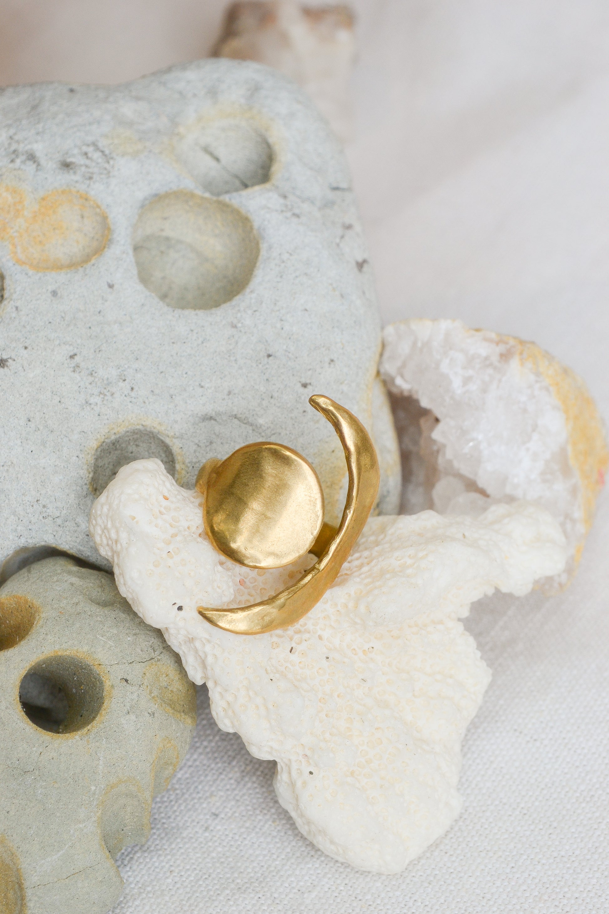 Handmade, yellow bronze equinox ring: a symbol of the balance between the sun & moon, day & night, dark & light. Made sustainably in California by Amanda Hunt.