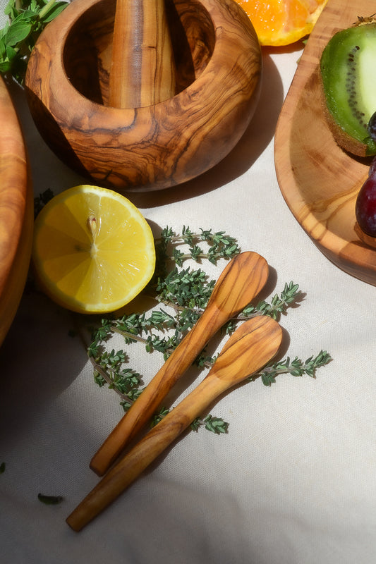Made by hand in Tunisia with olive trees that had finished producing olives. Cute mini spoons can scoop up the perfect pinch of salt or spices. Also great for serving dips, jams and more!