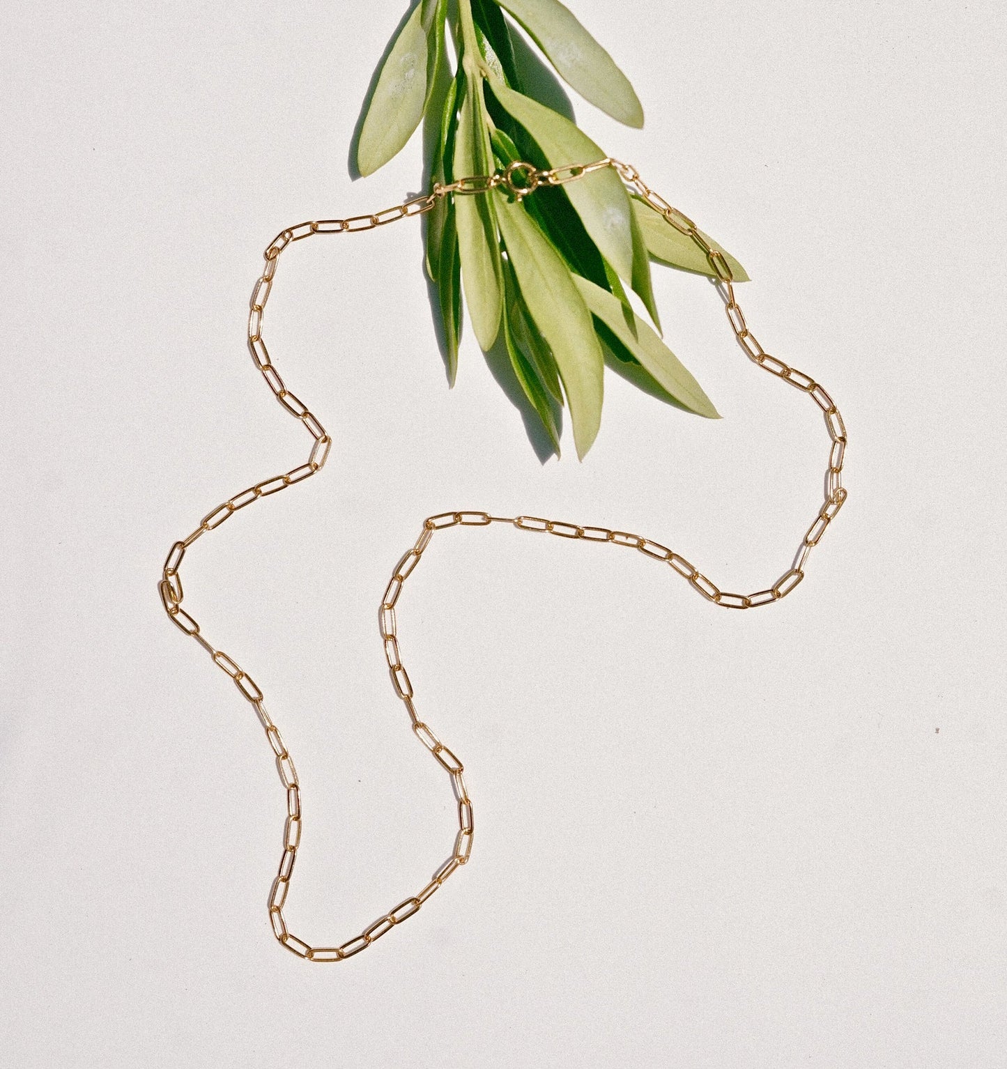 The Allora necklace - with interlocking soft oval links that sit elegantly along the neckline. As an ode to love that never parts, the links are designed to resemble the infinity symbol. Wear it solo or layered with other necklaces in this collection. Handmade in the Santa Cruz Mountains.