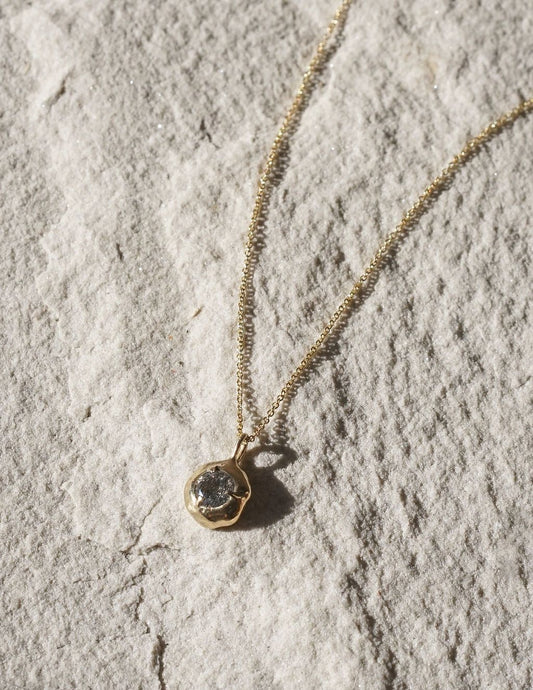 The Keeper Necklace is a quartz pendant necklace handmade in northern California by Amanda Hunt. Keep the energy of quartz close to your heart.