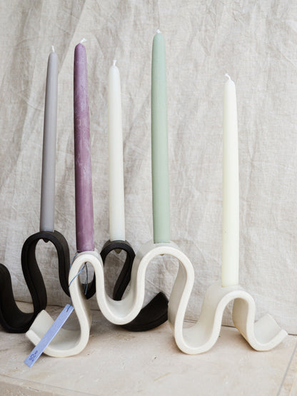 Meet Wyat: A stoneware candelabra with indulgent waves that support candlelight glow for every joyous dance party or intimate conversation over dinner. Handmade in Brooklyn, NY.