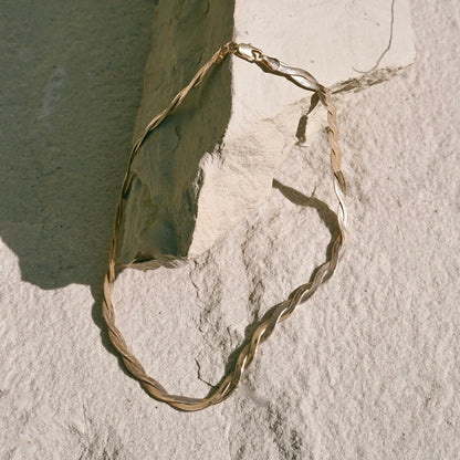 Kalia Necklace by Mountainside Jewelry. A dramatic flat textured twisted chain necklace with fine braided detail - an elegant addition to any style, designed to be dainty and delicate as well as bold and fierce, this piece was crafted by hand with love and care. Handmade in the Santa Cruz Mountains.